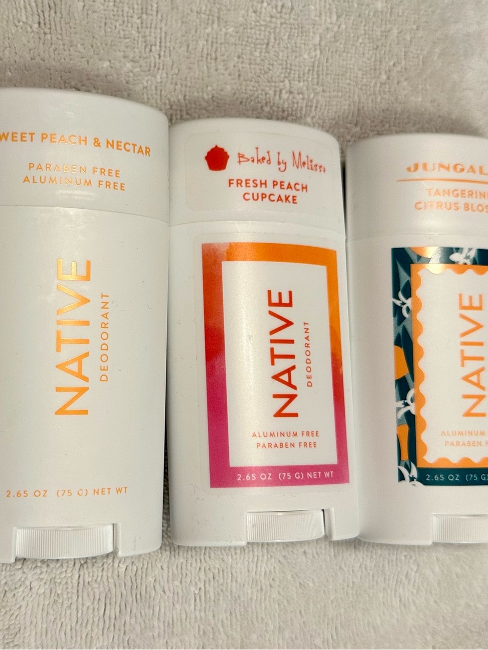 Native Deodorant Trio in White with Orange & Pink Accents